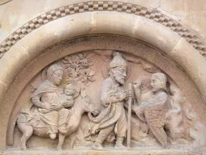 Morlaàs church - Portal of the Sainte-Foy Romanesque church: Detail of the tympanum depicting the Flight into Egypt