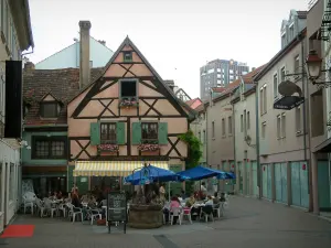 Mulhouse - Café terrace, half-timbered house and buildings