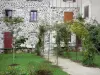 Mur-de-Barrez - Garten Marie, vom Mittelalter inspiriert, und Fassaden der mittelalterlichen Stätte