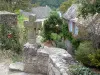 Najac - Cross and house of the medieval village