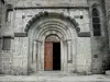 Nasbinals - Portal of the Sainte-Marie Romanesque church; in the heart of Lozèrian Aubrac