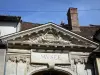 Nemours - Carved pediment of the portal of the castle-museum