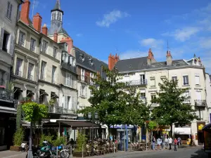 Nevers - Café terrace and facade of the Place Saint-Sébastien square, belfry tower overlooking the place