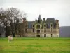 Norman Seine River Meanders Regional Nature Park - The Ételan castle of Flamboyant Gothic style, horse in a prairie and trees