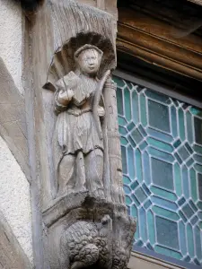 Noyers - Figure carved on the facade of an old half-timbered house