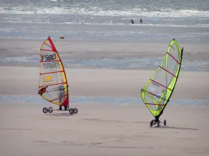 Opal Coast landscapes - Sandy beach with two people speed-sailing (windsurfing boards with wheels) and the Channel (sea), at Hardelot-Plage (Regional Nature Park of Opal Capes and Marshes)