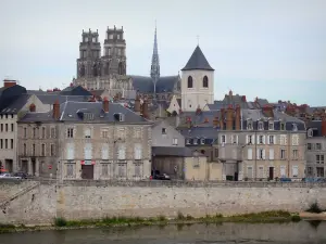 Orléans - Towers of the Sainte-Croix cathedral (Gothic building), bell tower of the Saint-Donatien church, houses and buildings of the city, the Loire River