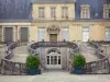 Palace of Fontainebleau - Horseshoe staircase in the White Horse courtyard (Farewell courtyard) and facade of the Palace of Fontainebleau