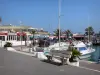 Palavas-les-Flots - Seaside resort: quay, bench, boats of the sailing port, cafe and restaurant terraces