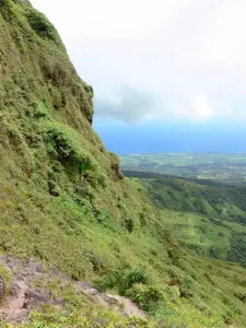 Pelée mountain - View of the slopes of the volcano and the Martinique coast from the trail Spoiler
