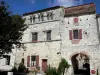 Penne-d'Agenais - Town gate and facade of a house