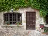 Pérouges - Door and window of a stone house