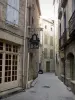 Pézenas - Old town: narrow paved street lined with houses