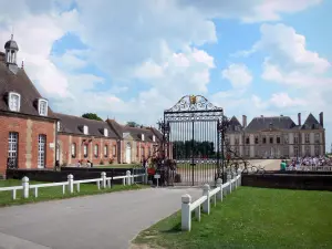 Le Pin national stud farm - Entrance gate, courtyard, castle and its outbuildings; in the town of Le Pin-au-Haras