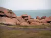 Pink granite coast - Footpath lined with lawn, big pink granite rocks and the Channel (sea) far off