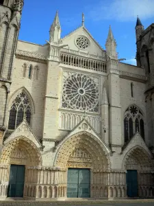 Poitiers - Saint-Pierre cathedral of Gothic style: facade, rose window, portals with the carved tympanums