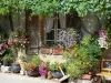 Pujols - Facade of a house with flower pots