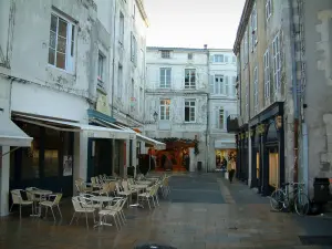 La Rochelle - Houses, café terrace and shops of the old town