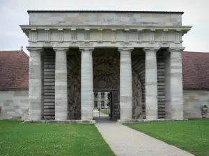 Royal saltworks of Arc-et-Senans - Columns of the Guards' building (entrance to the former saltworks) and path lined with lawns