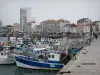 Les Sables-d'Olonne - Fishing port with its fishermen's boats moored to the quay, houses and buildings