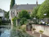 Saint-Calais - River Anille, floral decorations and houses of the town
