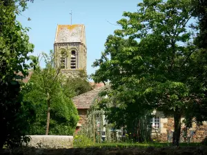 Saint-Céneri-le-Gérei - Tower of the Saint-Céneri Romanesque church, stone house and trees