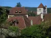 Saint-Cirq-Lapopie - Church bell tower and roofs of the village, in the Lot valley, in the Quercy