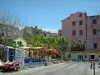 Saint-Florent - Houses, café terraces and restaurants of the seaside resort