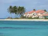 Saint-François - Residence lined with coconut trees overlooking the Raisins Clairs lagoon