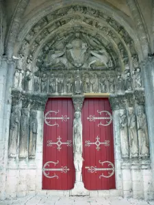 Saint-Loup-de-Naud church - Carved portal of early Gothic style of the Romanesque Saint-Loup church