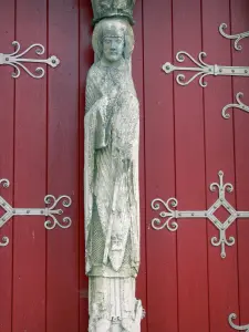 Saint-Loup-de-Naud church - Pier of the portal of the Romanesque Saint-Loup church: statue (sculpture) of Saint Loup