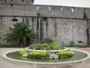 Saint-Malo - Fortification of the castle, palm tree and flower-bedecked fountain