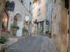 Saint-Paul-de-Vence - Narrow paved street in the village lined with shops