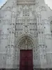 Saint-Riquier - Facade of the Saint-Riquier abbey church of Flamboyant Gothic style: central portal and its statuary (statues, sculptures)