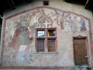 Saint-Sorlin-en-Bugey - Saint Christophorus Fresko (Wandmalerei) schmückend die Fassade eines Dorfhauses; im Bas-Bugey