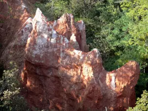 Saints valley - Fairy chimneys (column-like rock formations with caps) of ocher colour; in Boudes