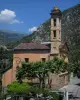 Saorge - Pénitents Rouges chapel (Saint-Sébastien chapel) and mountains in background