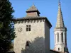 Sarrant - Square tower topped with a steeple and bell tower of the Saint-Vincent church