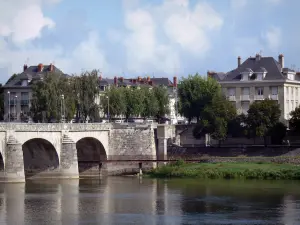 Saumur - Bridge spanning the Loire River, buildings of the Offard island and trees (Loire valley)