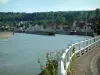 Skippers town - Longueil-Annel: protection rail, rosebush (roses), side canal of the Oise river with barges, banks, brick houses and trees