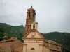 Speloncato - Church and houses in the village, hills in background (in the Balagne region)