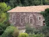 Sylvanès abbey - Former Cistercian abbey - Cultural Centre: conventual building surrounded by greenery
