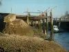 Talmont-sur-Gironde - Port with its pontoons and its moored boats at ebb tide