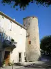 Taulignan - Tower of the old medieval ramparts and facade of a house