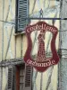 Thiers - Sign of a craft knife shop and facade of a half-timbered house in the background