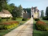 Thoury castle - Driveway lined with flowers and shrubs, leading to the castle; in the town of Saint-Pourçain-sur-Besbre, in Besbre valley