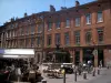 Toulouse - Houses, restaurants terraces and fountain of the Roger-Salengro square