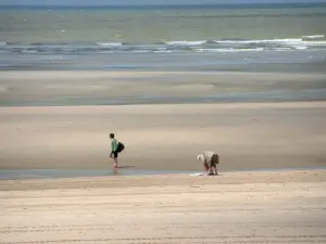 Touquet-Paris-Plage - Opal Coast: sandy beach with two walkers and the Channel (sea)