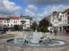 Tourcoing - Jets van water uit de Grote, winkels en huizen van de stad, wolken in de blauwe hemel