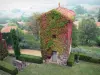 Usson - Dovecote and roofs of houses in the village; in the Livradois-Forez Regional Nature Park